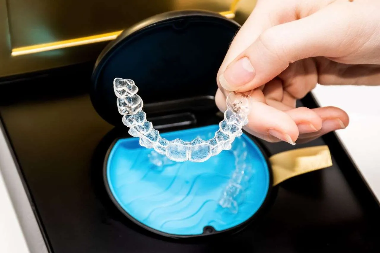 Clear Invisalign Aligners Placed On Teeth For Discreet Orthodontic Treatment